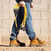 Man Carrying The Firman 3' Heavy Duty TT-30P to (3) 5-20R Short Power Cord Outdoors