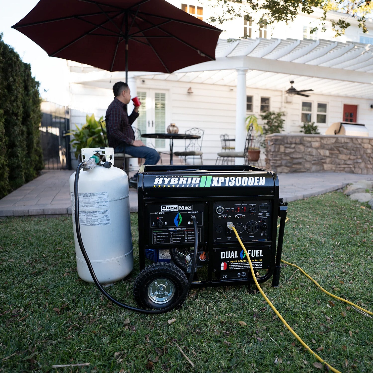 DuroMax XP13000EH Dual Fuel Portable Generator in the Backyard