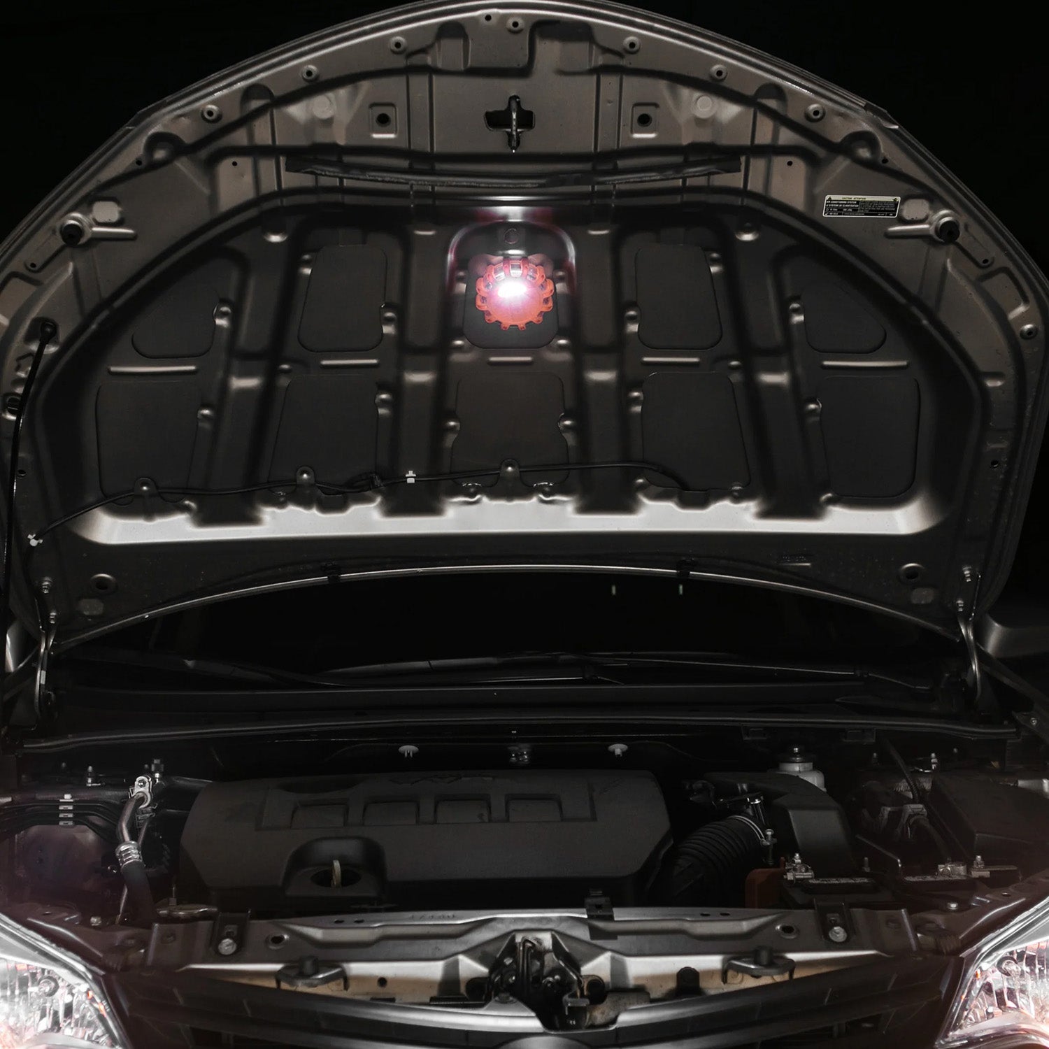 Wagan FRED Light Hanging Under a Car Hood